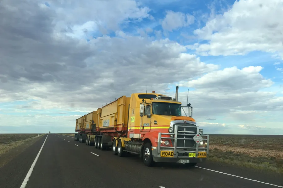 Semi-truck on the highway, representing DOT and commercial driver physicals